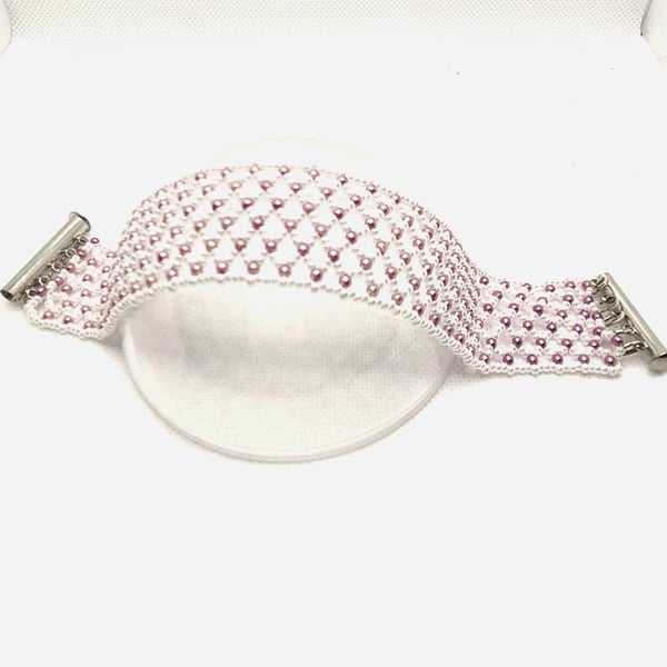 White netted bracelet with pink Swarovski pearls