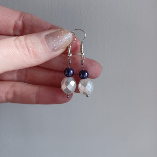 White pearlescent bead & purple pearl bead drop earrings