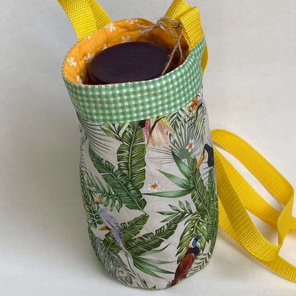 Water bottle carrier with pocket for phone. Tropical pattern with yellow
