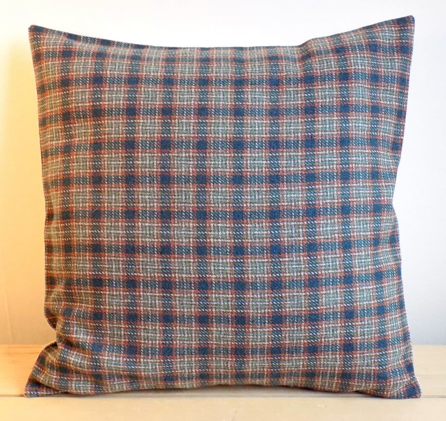 Cushion cover. Tartan plaid in teal and rust