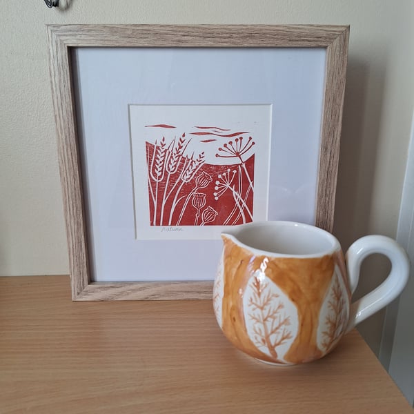 An original handprinted linoprint of an autumnal scene. 'Autumn'