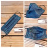 Face mask, 3 layer, machine washable in blue and black patterened cotton. 