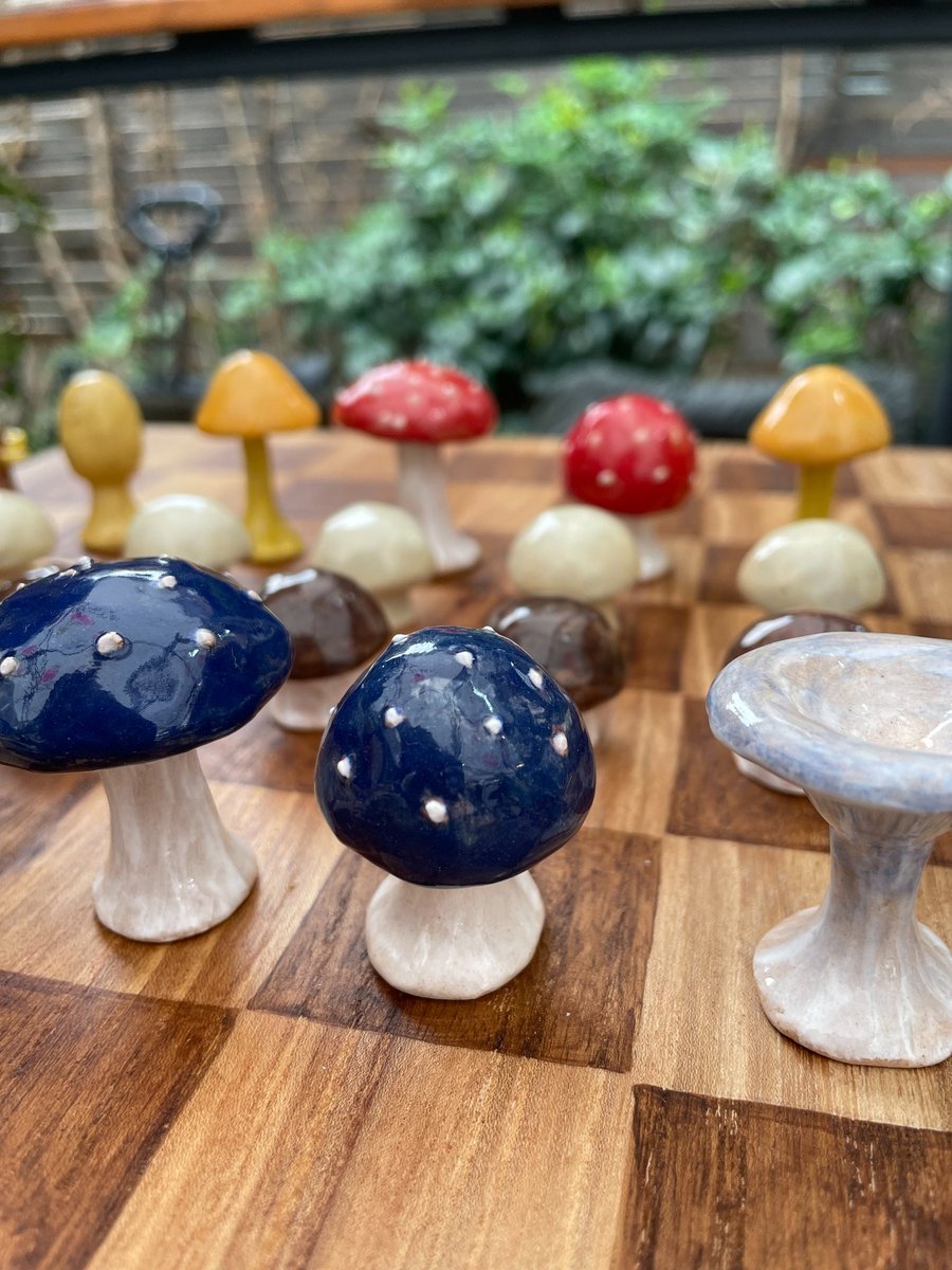 Handmade ceramic mushroom chess set with solid wood board