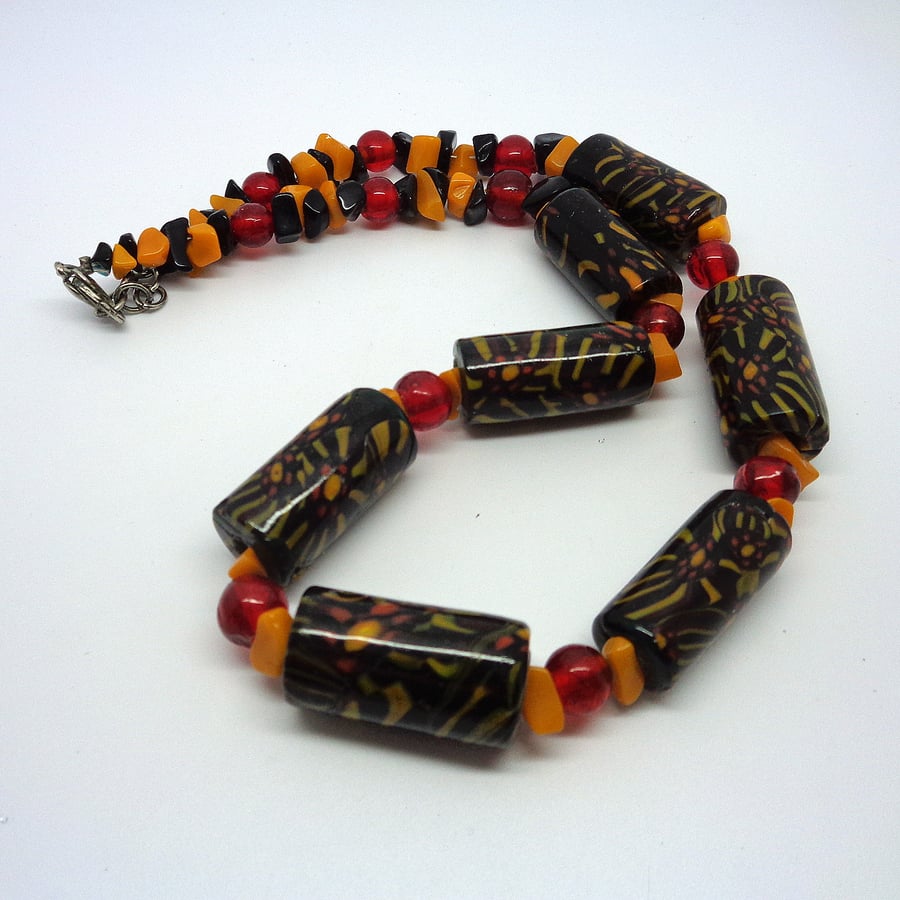 Glass bead ethnic-style necklace in black, orange & red
