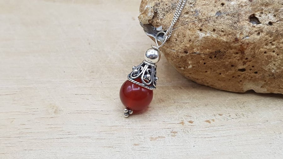 Minimalist Red Carnelian cone pendant. July birthstone necklace.