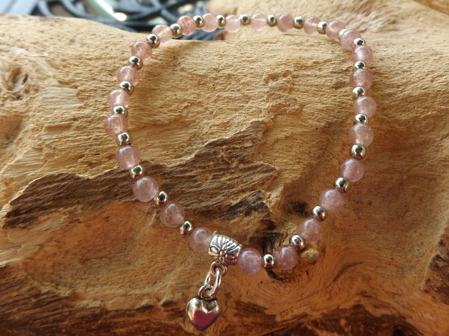Strawberry quartz stretch bracelet with silver heart charm