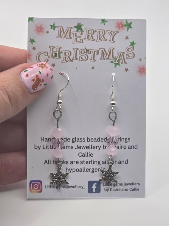 Snowflake charm earrings with light  pink glass beads and sterling silver hooks
