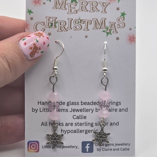Snowflake charm earrings with light  pink glass beads and sterling silver hooks