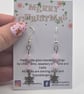 Snowflake charm earrings with light  pink glass beads and sterling silver hooks