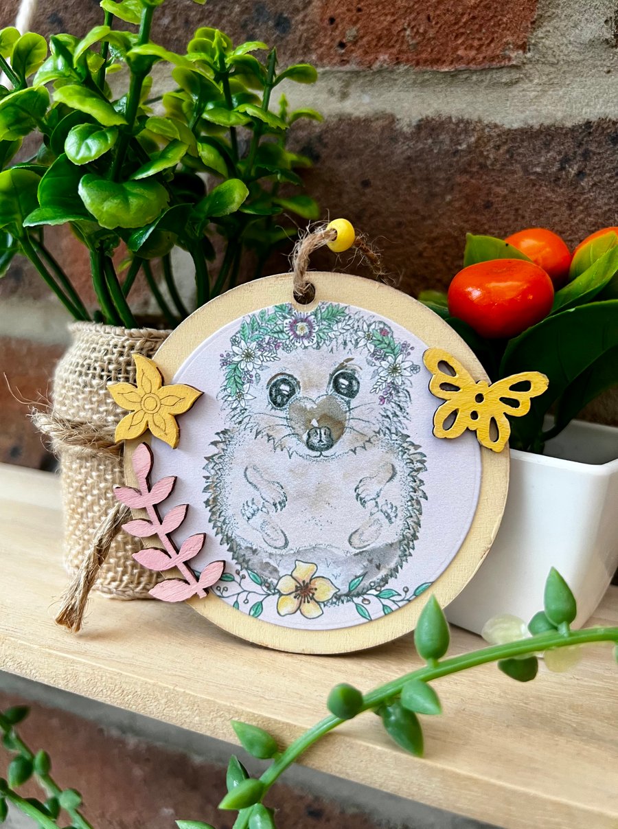 ‘Wooden hanging decoration’ - Artists Illustration of a hedgehog
