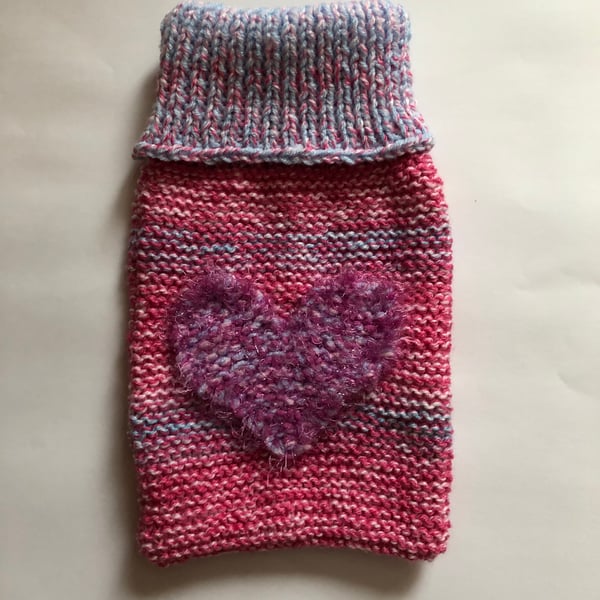 Hand knitted cosy hot water bottle cover