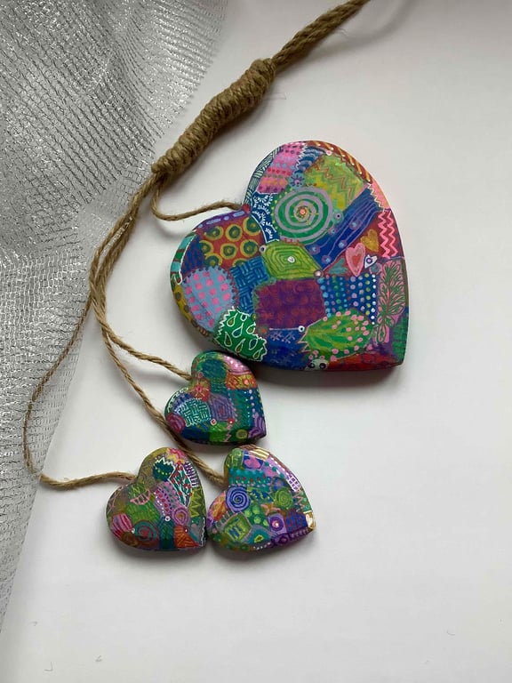 4 hanging abstract wooden hearts 