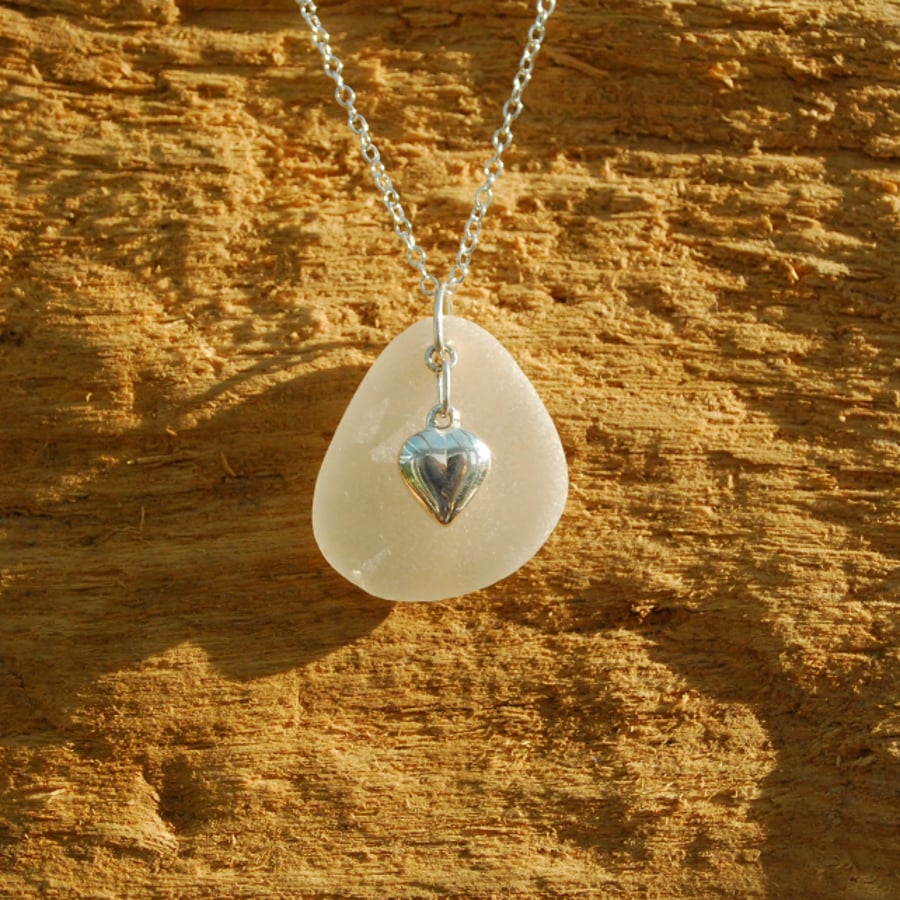 Sea glass pendant with sterling silver heart
