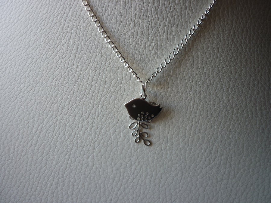 BIRD AND LEAF NECKLACE.  799