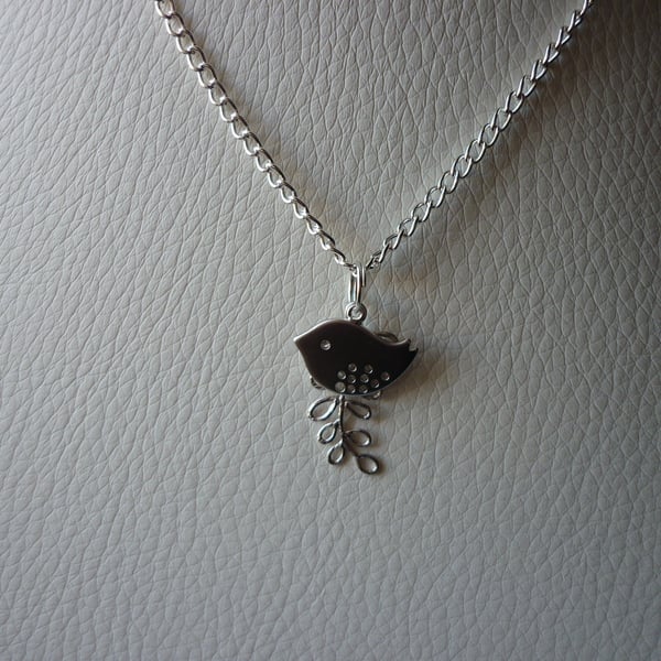 BIRD AND LEAF NECKLACE.  799