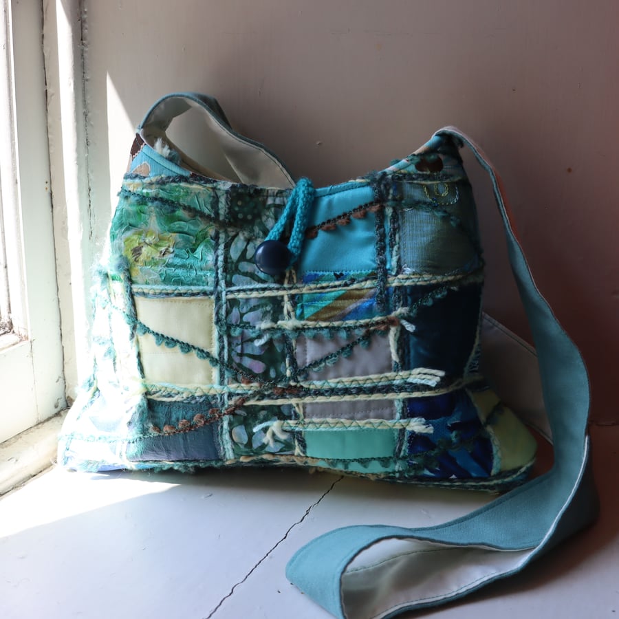 Sold. Coastal - textile art cross body bag in seaside greens and yellows