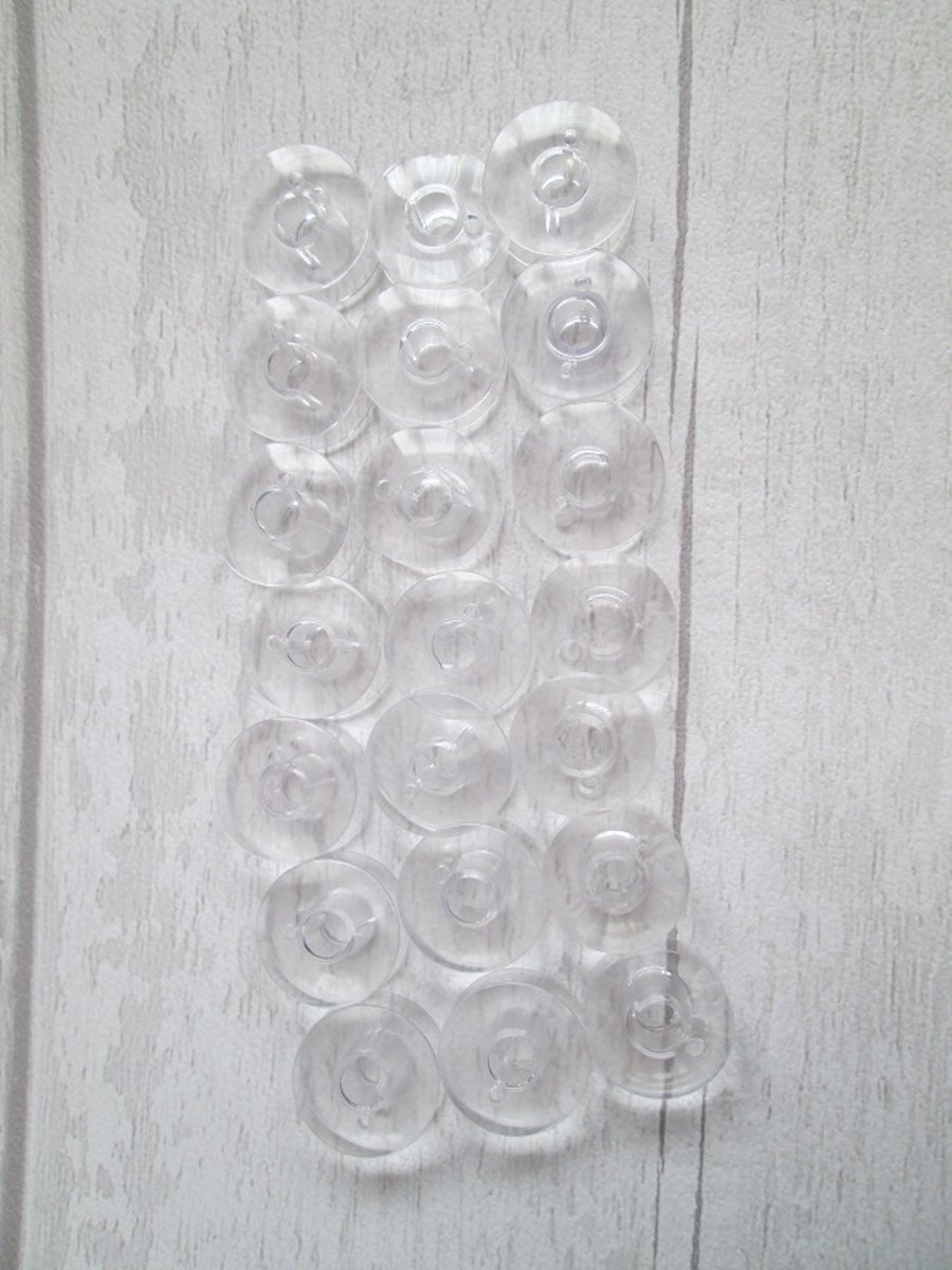 SOLD - 21 Plastic Sewing Machine Bobbins - for Singer Machines