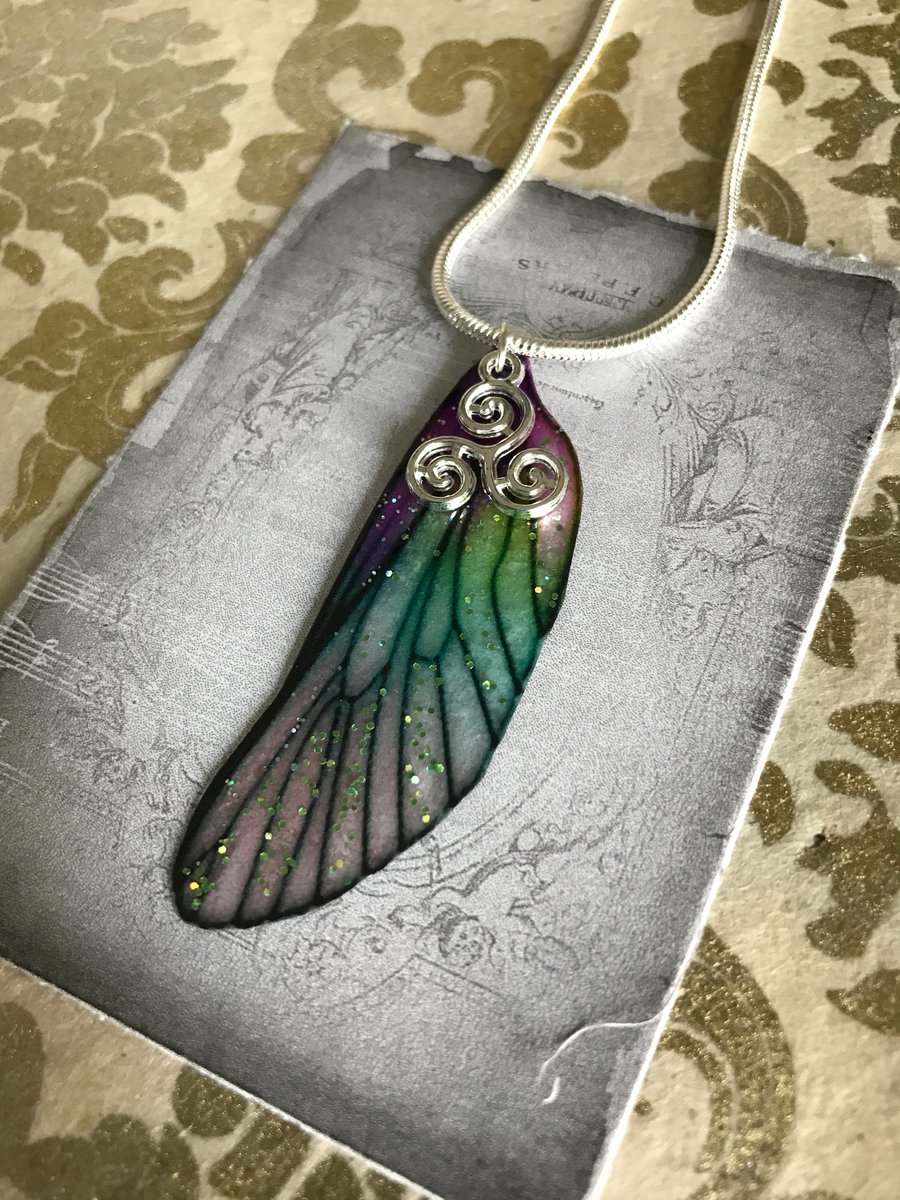 Purple and green sparkling sterling silver triskelion fairy wing necklace