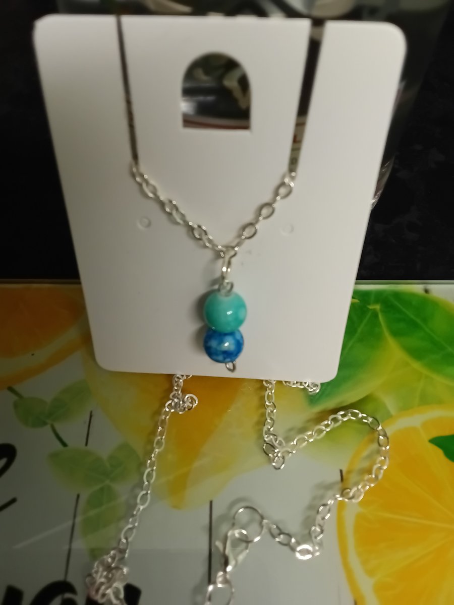 Beautiful turquoise & royal blue marbled beaded necklace,  silver plated chain 
