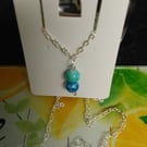 Beautiful turquoise & royal blue marbled beaded necklace,  silver plated chain 