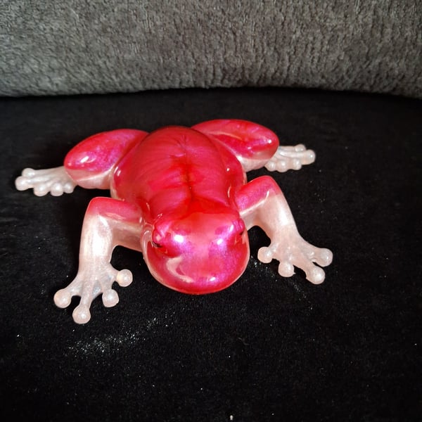Handmade epoxy resin frog ornament. Pale pink and cerise shimmer