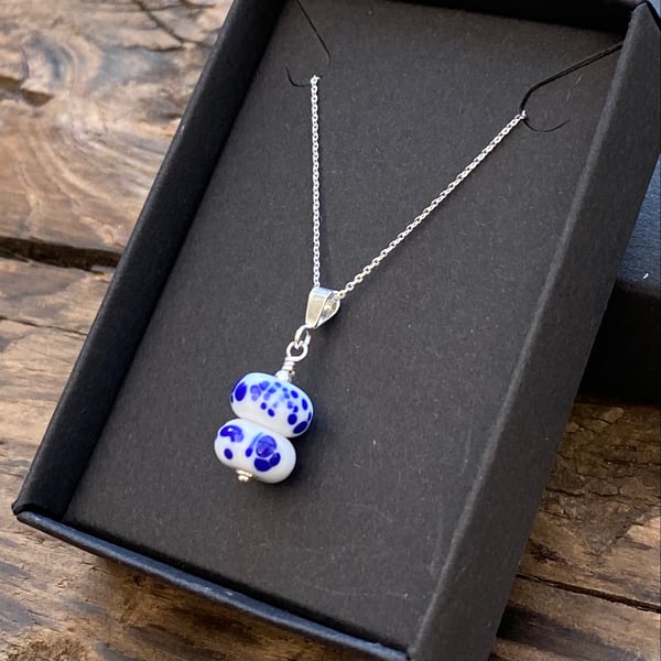 Mini lampwork pendant on sterling silver necklace. White & blue. 