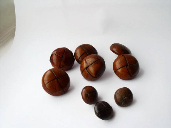 job lot of nine assorted vintage leather football shank buttons