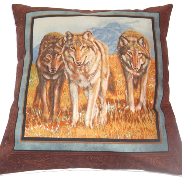 wolves walking forward in an autumnal meadow cushion
