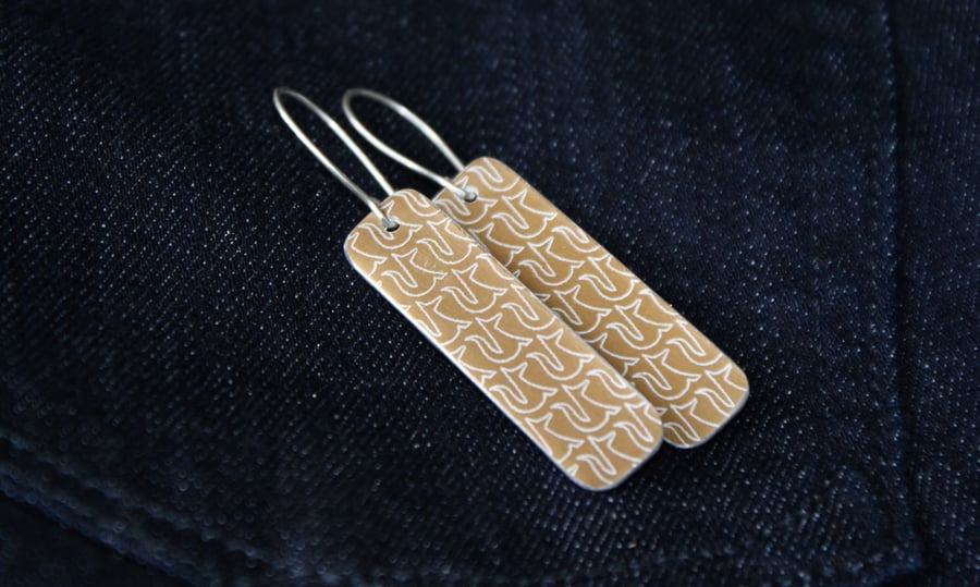 Fox pattern rectangular drop earrings - bronze