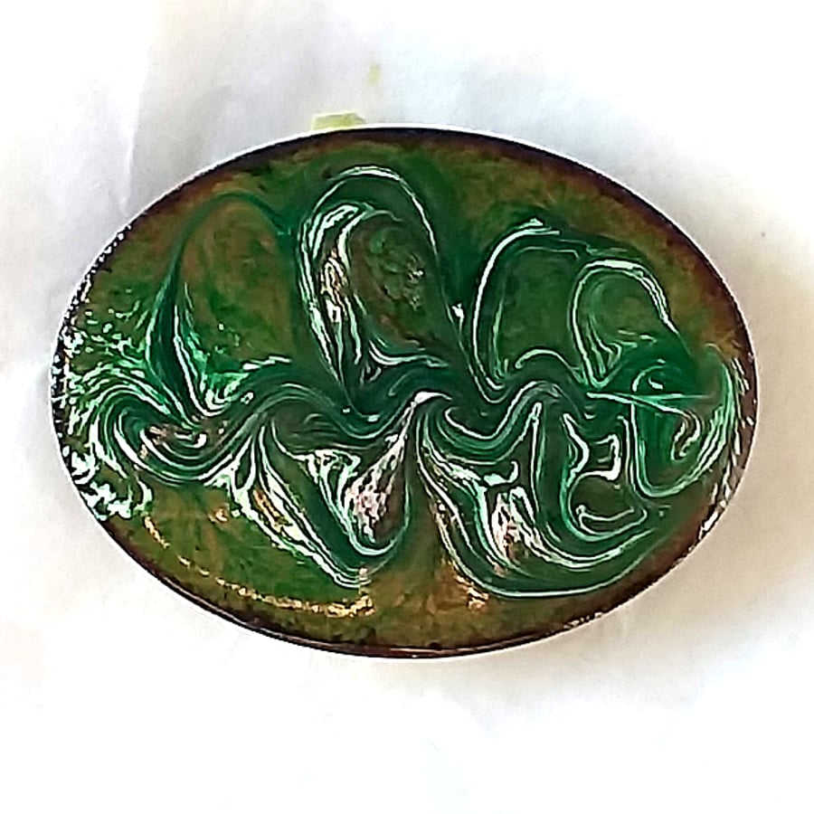 brooch - oval scrolled white with a hint of pink on green over clear enamel