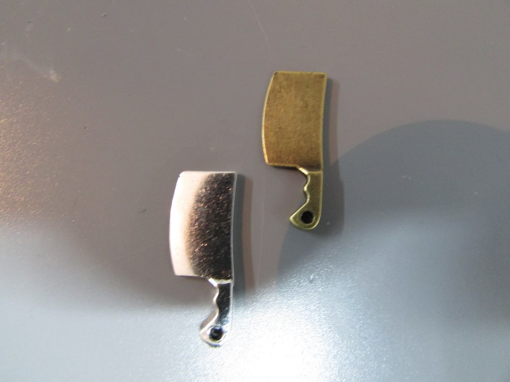 Cleaver Tibetan Charm available in silver or bronze