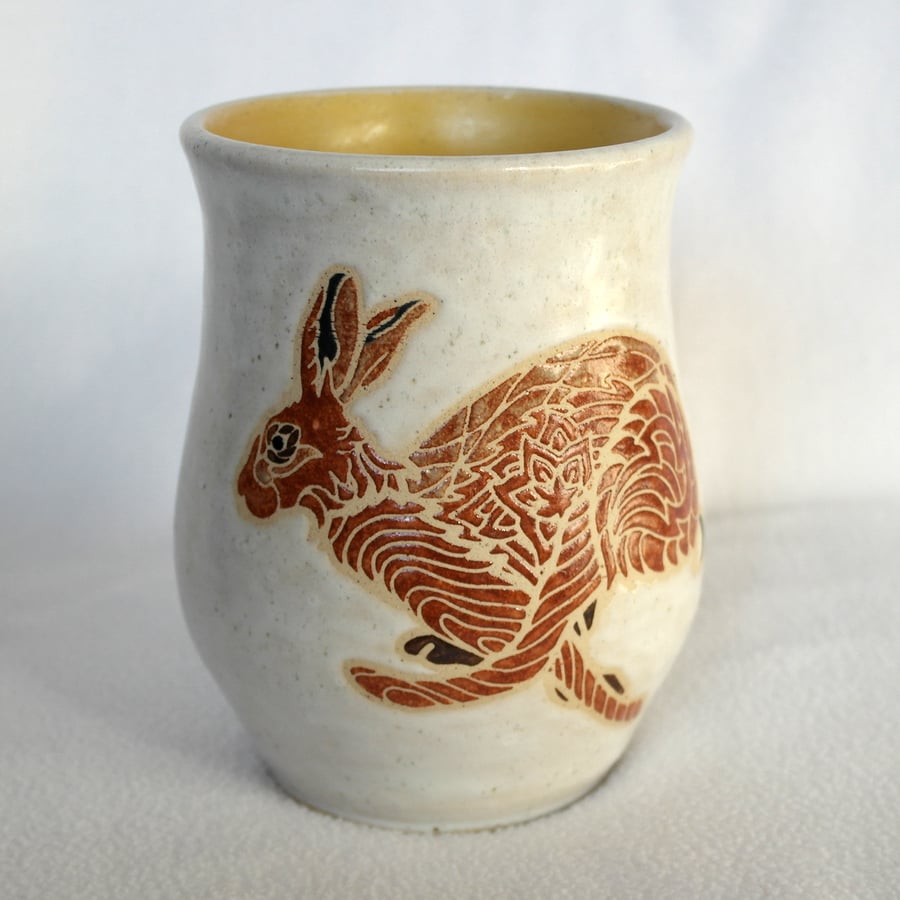 19-40 Stoneware pottery hand thrown vase or utensil holder with running hare