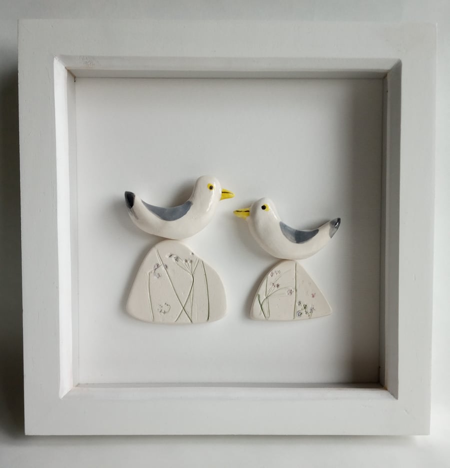 Framed ceramic seagulls