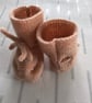 Hand knitted peach coloured bootees - Image 5