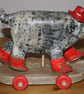 HAND MADE PAPER MACHE RED WELLY PIG WITH HAT ON WHEELS, FOLK ART INSPIRED
