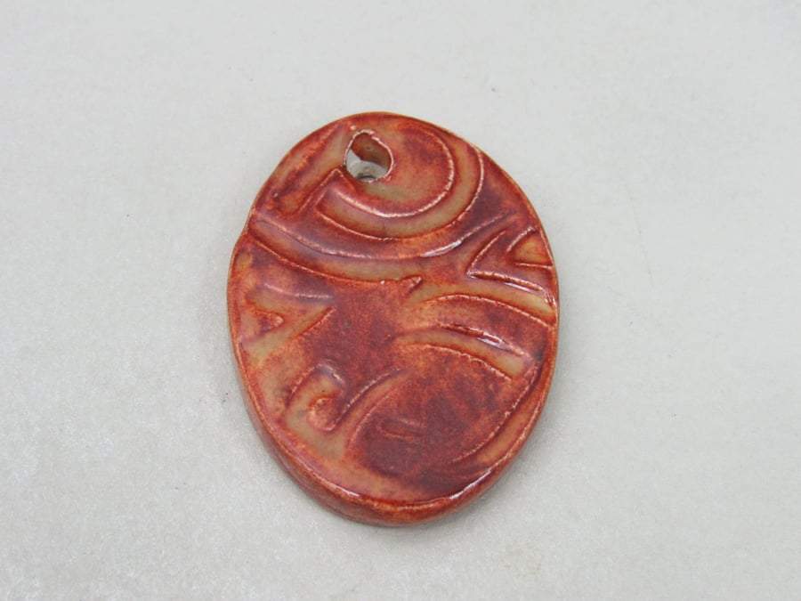 Large Bright Copper Brown Knotwork Ceramic Pendant