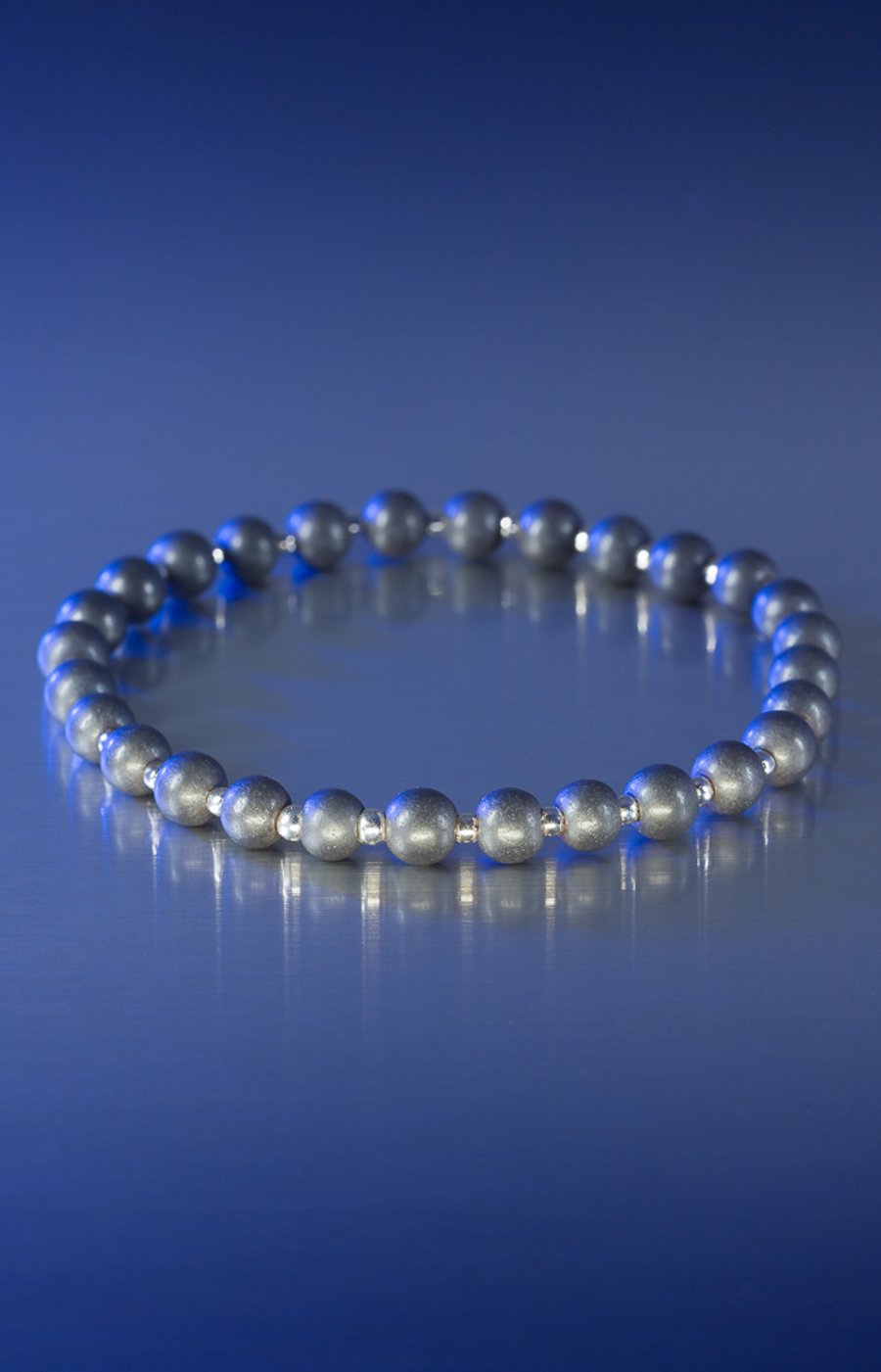 Custom order for Lee-Un-polished hematite and sterling silver stretch bracelet