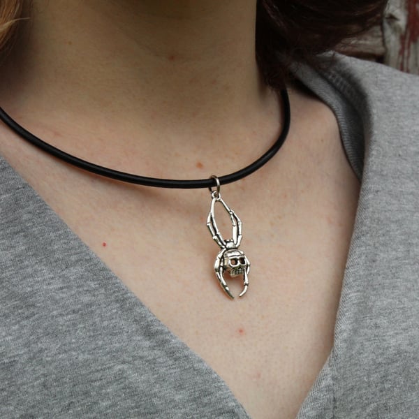 Skull spider charm leather thong necklace