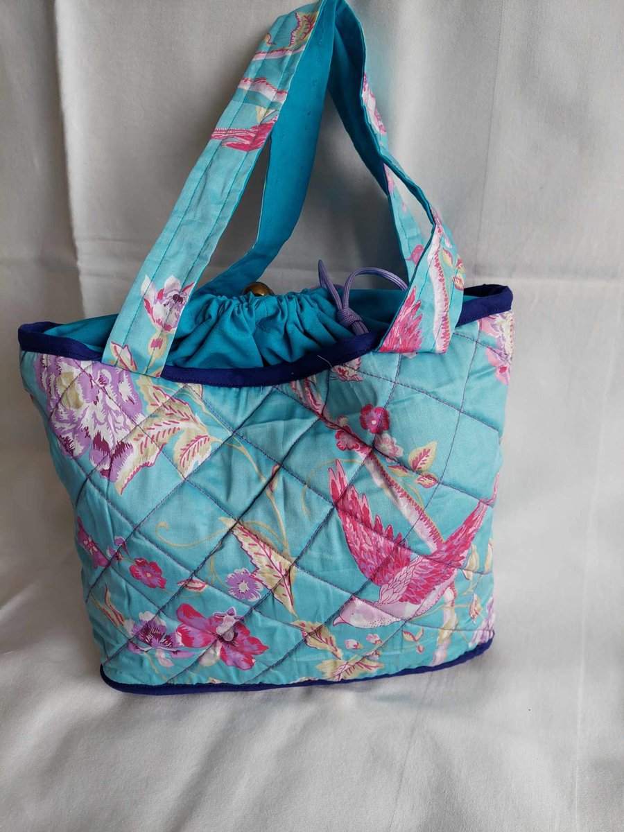 Upcycled quilted turquoise birds and flowers handbag 