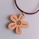 Flower shaped wooden pendant made from oak. Adjustable waxed cord necklace with 