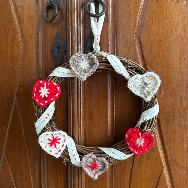 Scandi-style Christmas wreath with crocheted hearts and ribbon