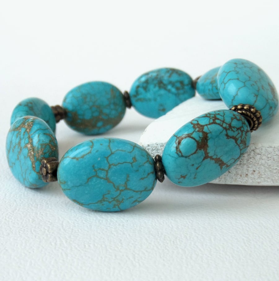 Turquoise coloured gemstone and bronze handmade bracelet