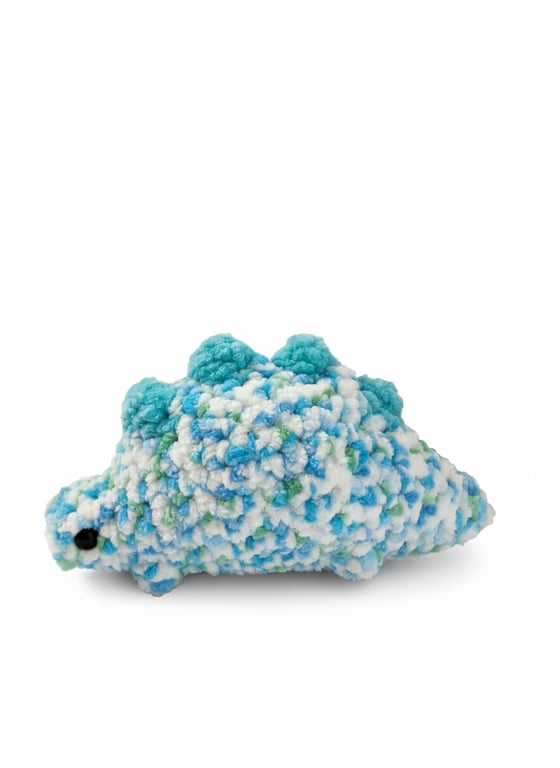 Cute crochet plushie stegosaurus dinosaur