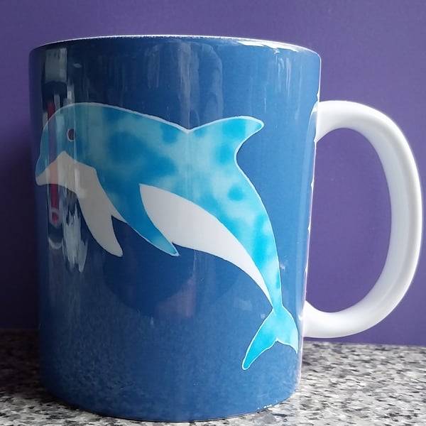White Ceramic Mug with Dolphin Design