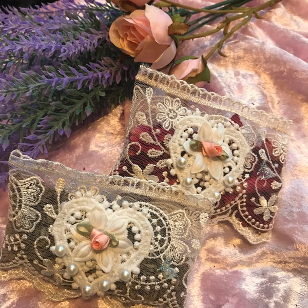 Pair of lace sachets. One each of lavender and rose