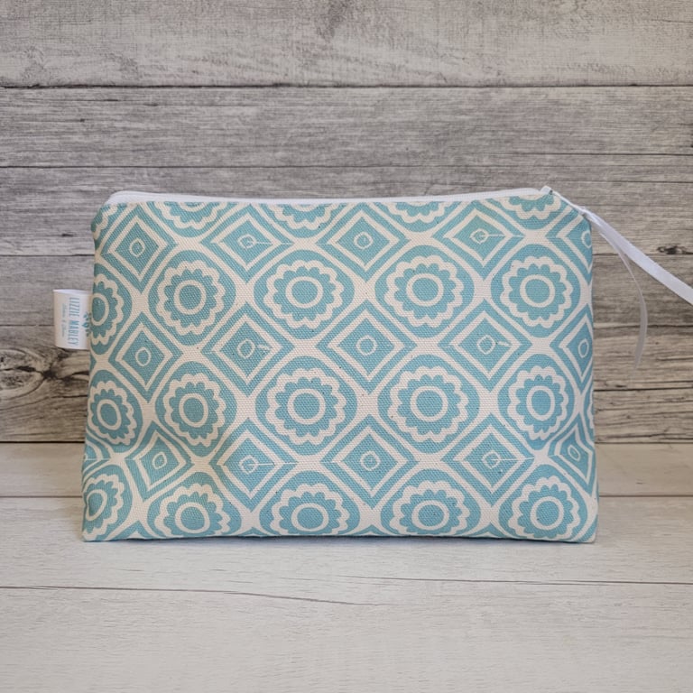 Zipped cosmetic bag in blue 'Rebecca' fabric 