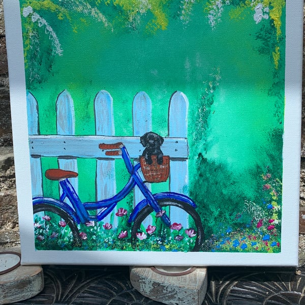 Painting. Acrylic. Black puppy in bicycle basket. Dog. Art. 