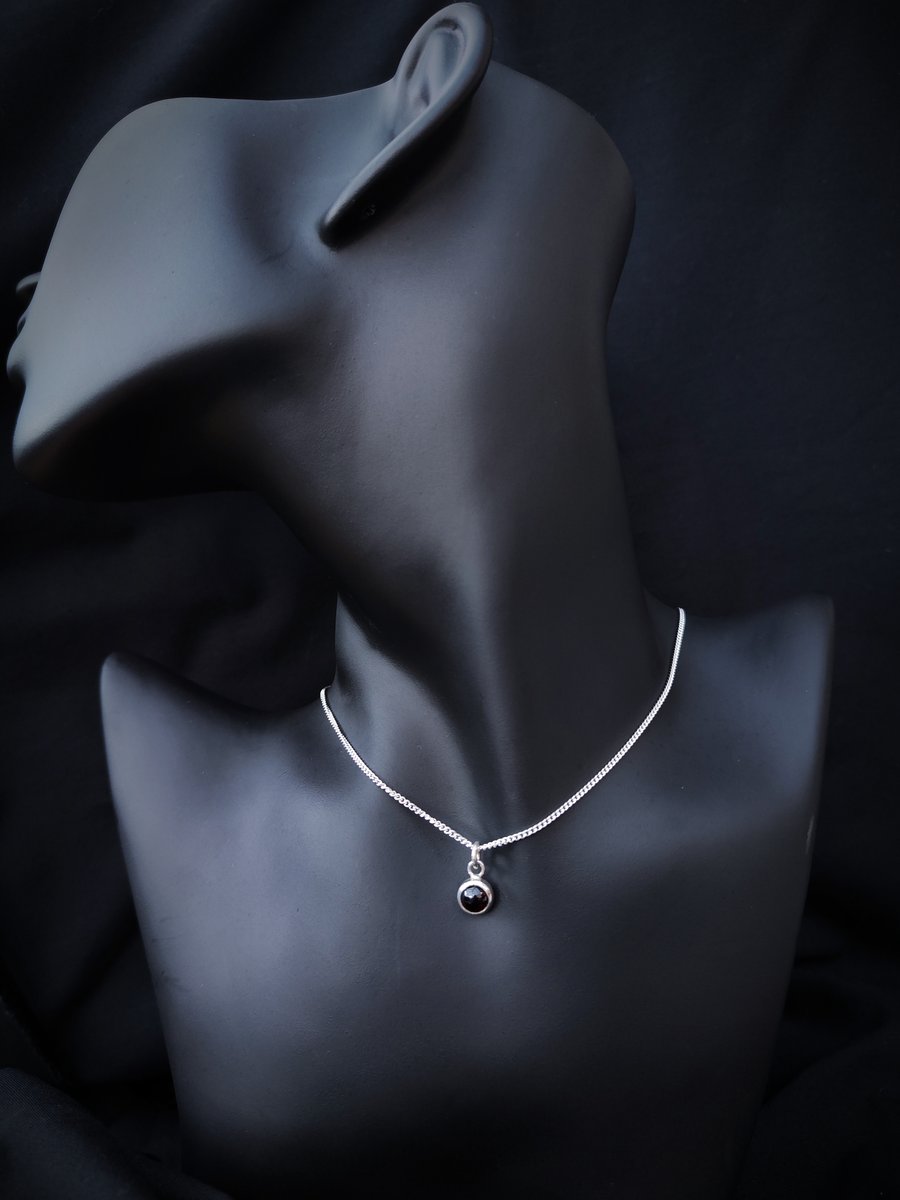 Sterling silver pendant with hessonite