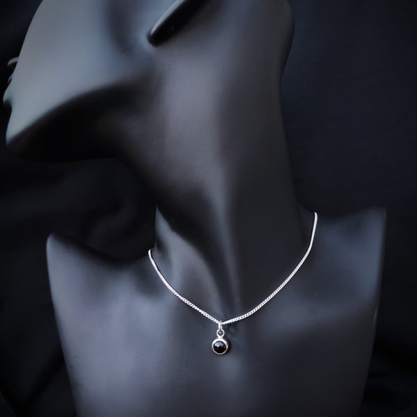 Sterling silver pendant with hessonite