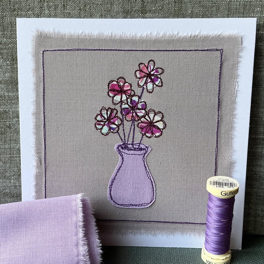 Embroidered appliqué greetings card with envelope.